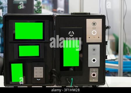 Professional smart video intercom, access control and security system demonstration kit with touch displays, indoor monitors and door stations for res Stock Photo
