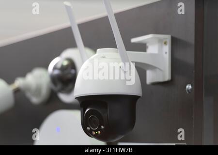 Modern wireless PTZ security camera with dual antennas for smart video surveillance, remote monitoring, property protection and AI-powered security sy Stock Photo