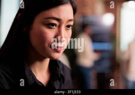 Tech engineer works on a programming project for a company data center, developing software and cyber security innovation inside an IT agency. Stock Photo