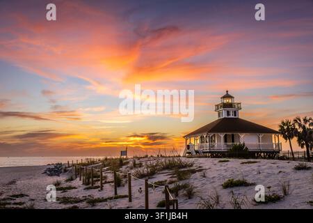 Scenic view of the historic Port Boca Grande Lighthouse and the beach at sunset Stock Photo