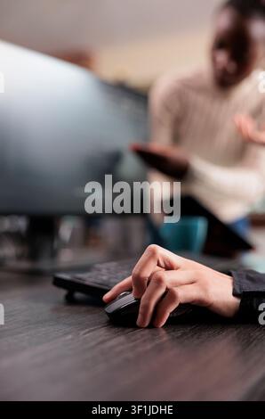 Engineer encrypting company information on blockchain highlighting security application engineer hand encrypting vital company information on blockchain system. Stock Photo