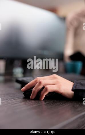 Programmer developing artificial intelligence processor capturing security application engineer encrypting vital company information on blockchain system. Stock Photo