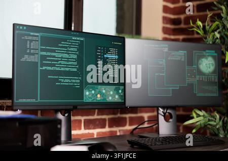 Computer screens display javascript code in an empty programming office, with security systems and data algorithms running in the background. Stock Photo