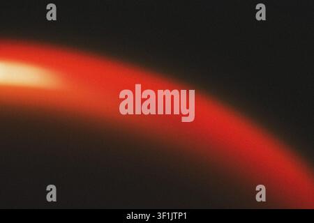 Sleek minimalist red and orange light streak over dark background with smooth gradient glow Stock Photo