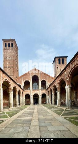 BArched portico in courtyard of asilica of Sant'Ambrogio Milan Italy Stock Photo