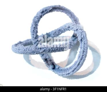 3D printed model of infinity loop. Voxel art style. Model created using photopolymer resin. Object printed on 3D printer from liquid resin isolated on white background SLA technology Stereolithography Stock Photo