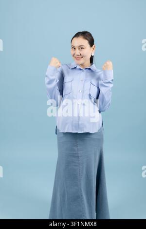 Man and woman sitting on picnic in studio  Stock Photo