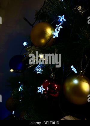Star-shaped lights, Christmas tree, Christmas Stock Photo