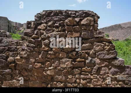 Weathered stone masonry wall texture from an ancient fortress ruins Stock Photo