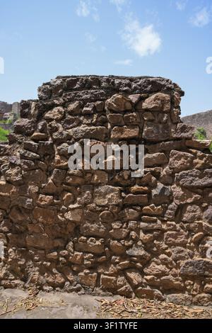 Weathered stone masonry wall texture from an ancient fortress ruins Stock Photo