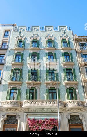 Barcelona - Spain - May, 27, 2026: Building Facade with Ornate Details, Wrought Iron Balconies, Architectural Heritage Stock Photo