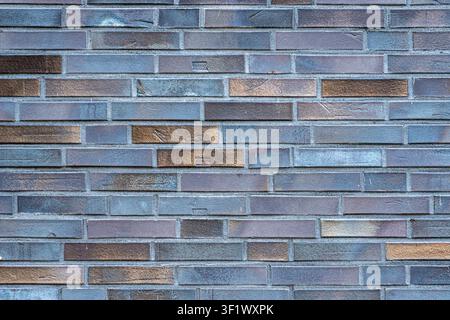 Modern Blue Grey Brick Wall Texture Background with Bronze Accents Stock Photo