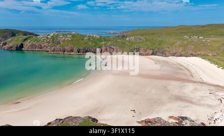 Oldshoremore Kinlochbervie Sutherland Scotland Polin pristine white sand beach and blue green sea in early summer Stock Photo