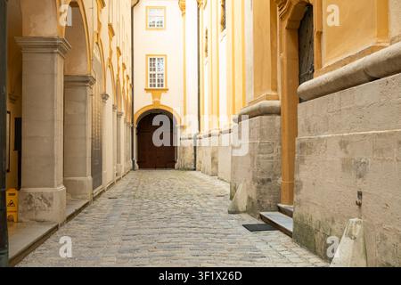 Baroque architecture elements with columns and stone walls in old European monastery Stock Photo