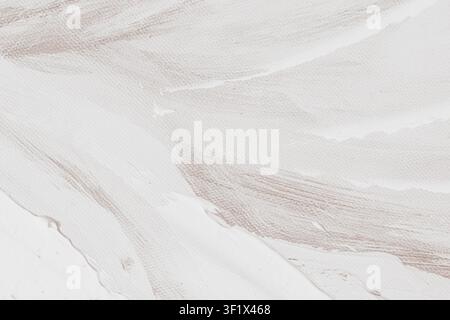 Horizontal close up of a soft watercolor paint spill on a textured canvas background showing delicate grey and blue stains with elegant gold metallic Stock Photo