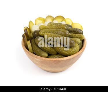 Pickled sliced cucumbers in wood bowl isolated. fermented food, marinated canned vegetables, gherkins, pickled cucumbers on white background Stock Photo