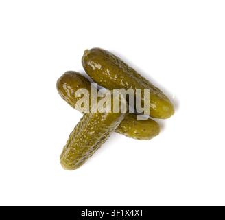 Gherkins pile isolated, pickled cornichons, salted small cucumbers, tiny fermented food, little marinated canned vegetables, pickled mini cucumbers on Stock Photo