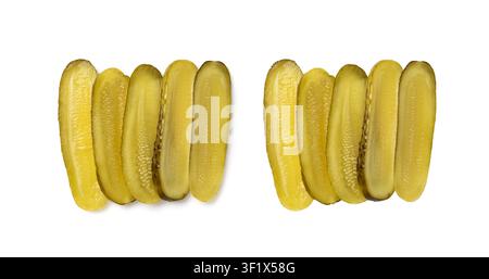 Pickled sliced cucumbers isolated, thinly sliced fermented food, marinated canned vegetables, gherkins, pickled cucumbers on white background Stock Photo