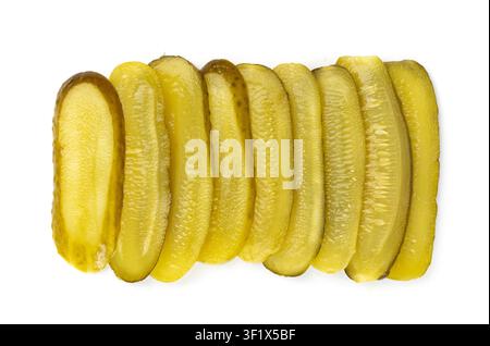 Pickled sliced cucumbers isolated, thinly sliced fermented food, marinated canned vegetables, gherkins, pickled cucumbers on white background Stock Photo
