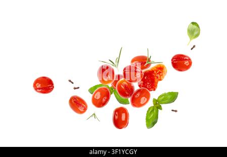 Falling Pickled Cherry Tomatoes Isolated, Flying Small Tomato, Healthy Fermented Vegetables, Salted Marinated Food, Pickled Tomatoes on White Backgrou Stock Photo