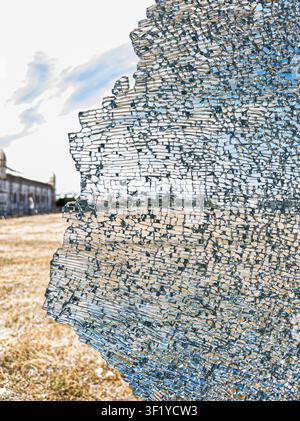 Detailed image of a broken and cracked tempered glass window. Stock Photo