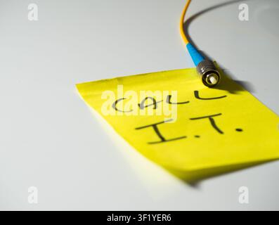 Reminder note to call network technician  Stock Photo