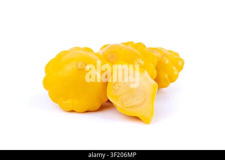 Marinated patty pan isolated, pickled pattypan squash, salted yellow patisson, fermented baby scallop, custard granny squash on white background Stock Photo