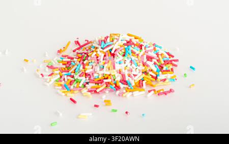 Candy Sprinkle Pile, Donut Rainbow Sprinkles Isolated, Sweet Color, Many Small Vermicelli on White Background Stock Photo