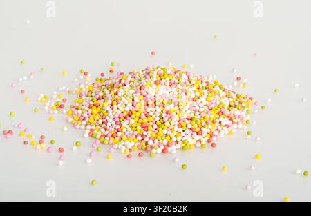 Candy Sprinkle Pile, Donut Rainbow Sprinkles Isolated, Sweet Color, Many Small Vermicelli on White Background Stock Photo