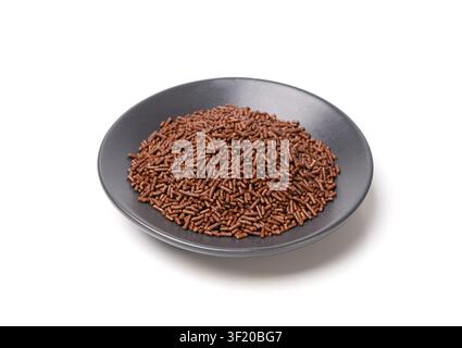 Candy Sprinkle Pile, Donut Chocolate Sprinkles Isolated, Sweet Brown Hagelslag Glaze Decoration, Chocolate Vermicelli on White Background Stock Photo