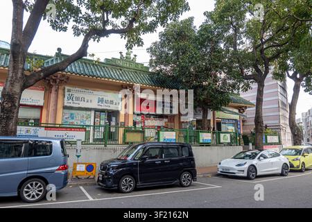 view of Yau Yat Plaza, shopping arcade constructed in a traditional Chinese architectural style in Yau Yat Chuen, Kowloon, Hong Kong Stock Photo