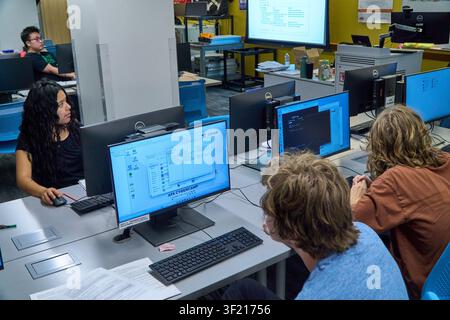 Palm Desert, California, USA. 14th July, 2026. Students work through hands-on cybersecurity exercises during the Air & Space Forces Association Palm Springs Chapter 134 Summer Cyber Camp at the College of the Desert Information Technology Center. The week-long program gives high school students practical experience in cybersecurity, computer networking, coding, artificial intelligence, and cyber defense through guided classroom instruction and real-world technology exercises. (Credit Image: © Ian L. Sitren/ZUMA Press Wire) EDITORIAL USAGE ONLY! Not for Commercial USAGE! Stock Photo
