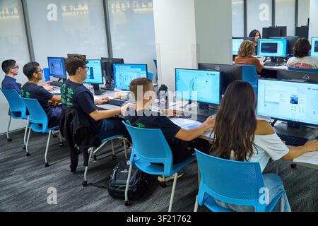 Palm Desert, California, USA. 14th July, 2026. Students work on hands-on cybersecurity exercises during the Air & Space Forces Association Palm Springs Chapter 134 Summer Cyber Camp at the College of the Desert Information Technology Center. The week-long program provides high school students with practical experience in cybersecurity, computer networking, coding, artificial intelligence, and cyber defense through instruction from educators, industry professionals, and AFA volunteers. (Credit Image: © Ian L. Sitren/ZUMA Press Wire) EDITORIAL USAGE ONLY! Not for Commercial USAGE! Stock Photo
