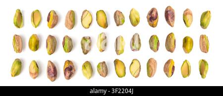 Fried salt pistachio nuts set isolated. Baked pistachios grains, roasted green pistache fruits and kernels collection on white background flat lay top Stock Photo