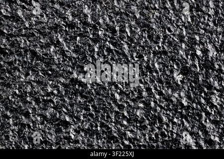 Black painted cast iron texture surface background macro close up rough metallic material dark backdrop pattern, structure industrial solid gritty coa Stock Photo
