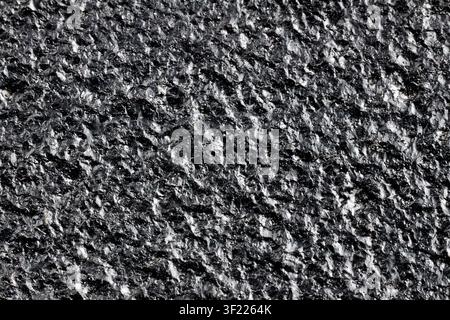 Black painted cast iron texture surface background macro close up rough metallic material dark backdrop pattern, structure industrial solid gritty coa Stock Photo