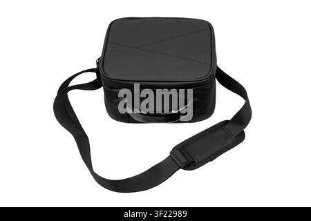 Black padded shoulder bag with strap isolated on white background. Stock Photo