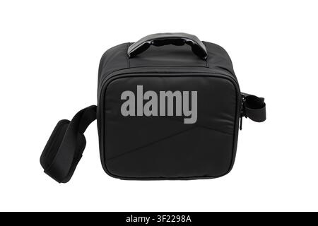 Black padded shoulder bag with strap isolated on white background. Stock Photo