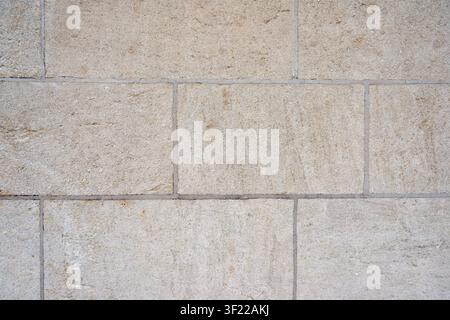 Light Beige Limestone Block Wall Texture Background with Natural Stone Pattern Stock Photo