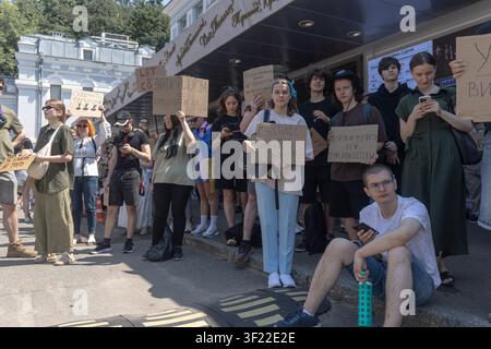 Demonstrators gather outside a building during unrest in Lyon, France ...