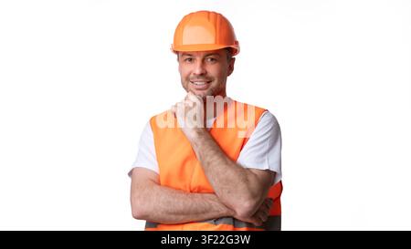 Builder Worker In Orange Uniform Posing Over White Background, Panorama Stock Photo