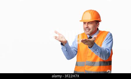 Discontented Construction Worker Gesturing Posing On White Background, Panorama Stock Photo