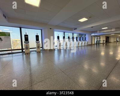 Malaga airport, Andalusia, Spain. 7th July 2026. Pictured: Rows of self-service EES (Entry/Exit System) kiosks remain unused. /  Bosses at Ryanair hav Stock Photo