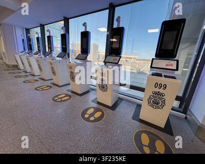 Malaga airport, Andalusia, Spain. 7th July 2026. Pictured: Rows of self-service EES (Entry/Exit System) kiosks remain unused. /  Bosses at Ryanair hav Stock Photo