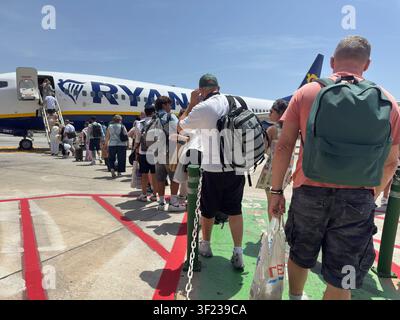 Malaga airport, Andalusia, Spain. 11th July 2026. Pictured: Passengers board a Ryanair airplane at Malaga airport. Stock Photo