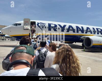 Malaga airport, Andalusia, Spain. 11th July 2026. Pictured: Passengers board a Ryanair airplane at Malaga airport. Stock Photo