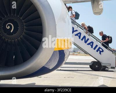 Malaga airport, Andalusia, Spain. 11th July 2026. Pictured: Passengers board a Ryanair airplane at Malaga airport. Stock Photo