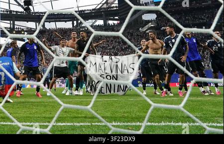 Argentina players hold up a banner with the words 'Las Malvinas son Argentinas' following victory in the FIFA World Cup 2026 semi-final match at the Atlanta Stadium. Downing Street has backed a minister’s call for Fifa to investigate whether Argentina players broke rules by waving a banner in support of their country’s claims to the Falkland Islands, saying: “The World Cup might not be ours, but the Falkland Islands definitely are.” Picture date: Wednesday July 15, 2026. Stock Photo