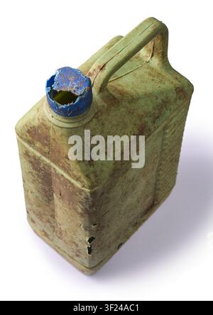 old dirty green plastic jerrycan isolated white background, weathered container with broken blue cap and mud stains, top view in close-up Stock Photo