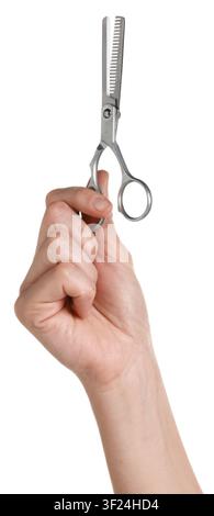 Hairdresser holding thinning scissors on white background, closeup Stock Photo